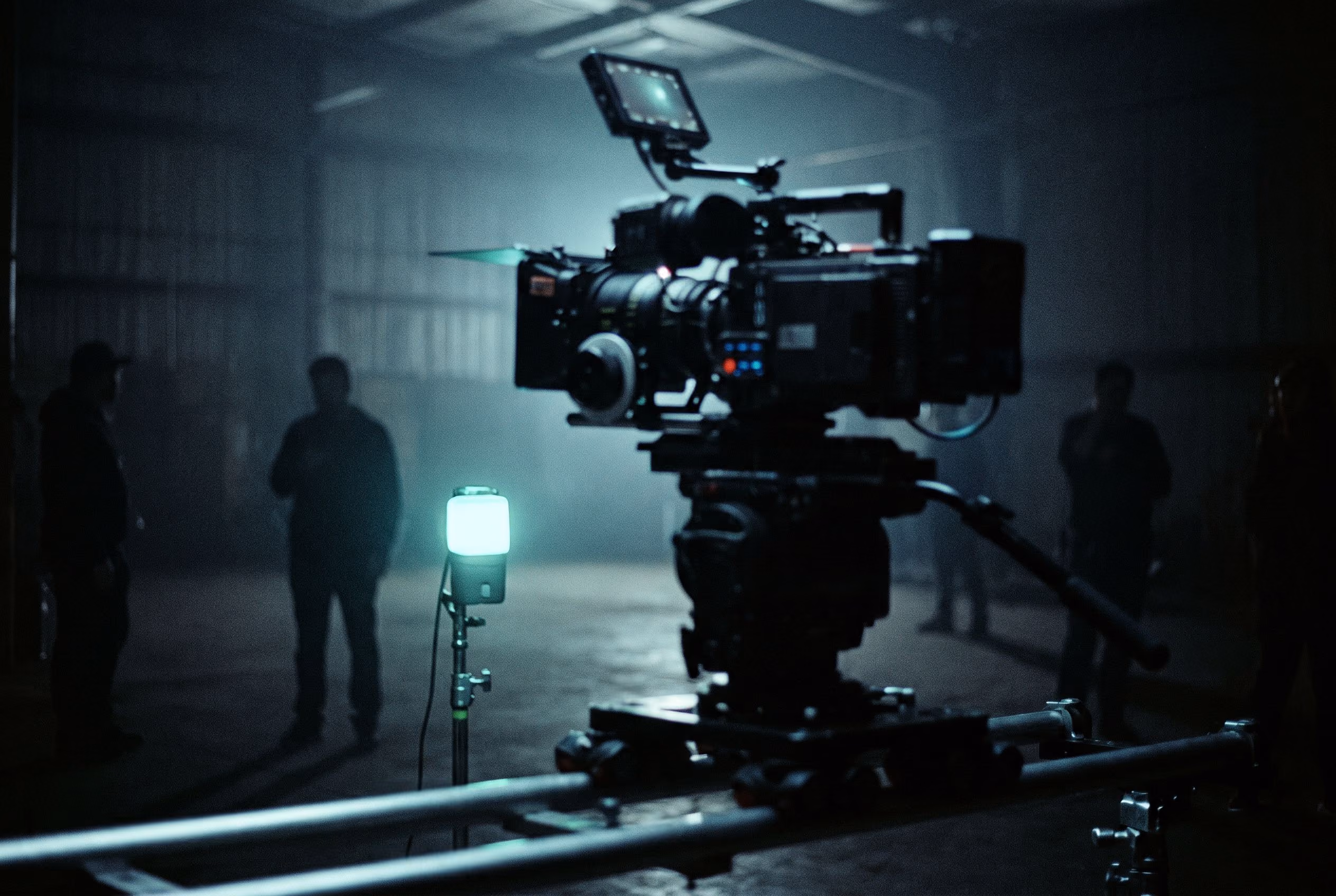 Cinema camera rig in a dark warehouse production space