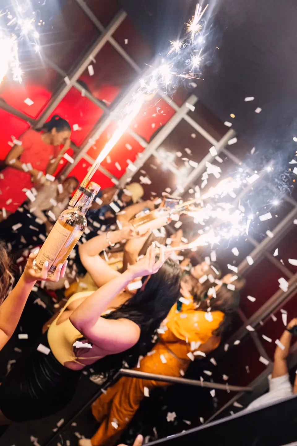 Sparklers and confetti over the crowd