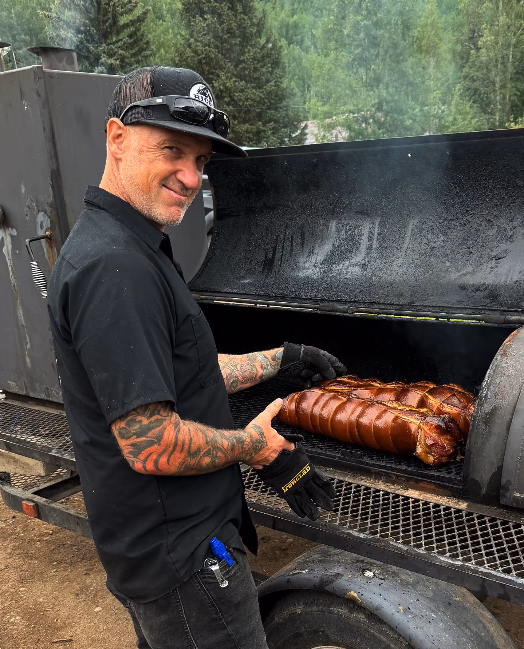 Chef Will Nolan at the smoker