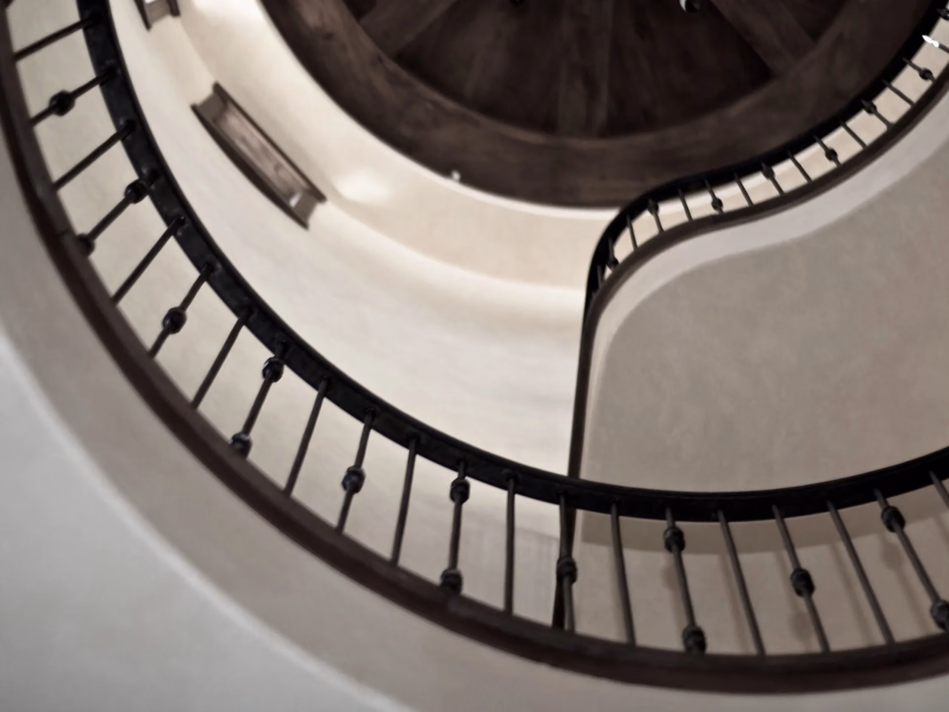 A curved railing seen from above