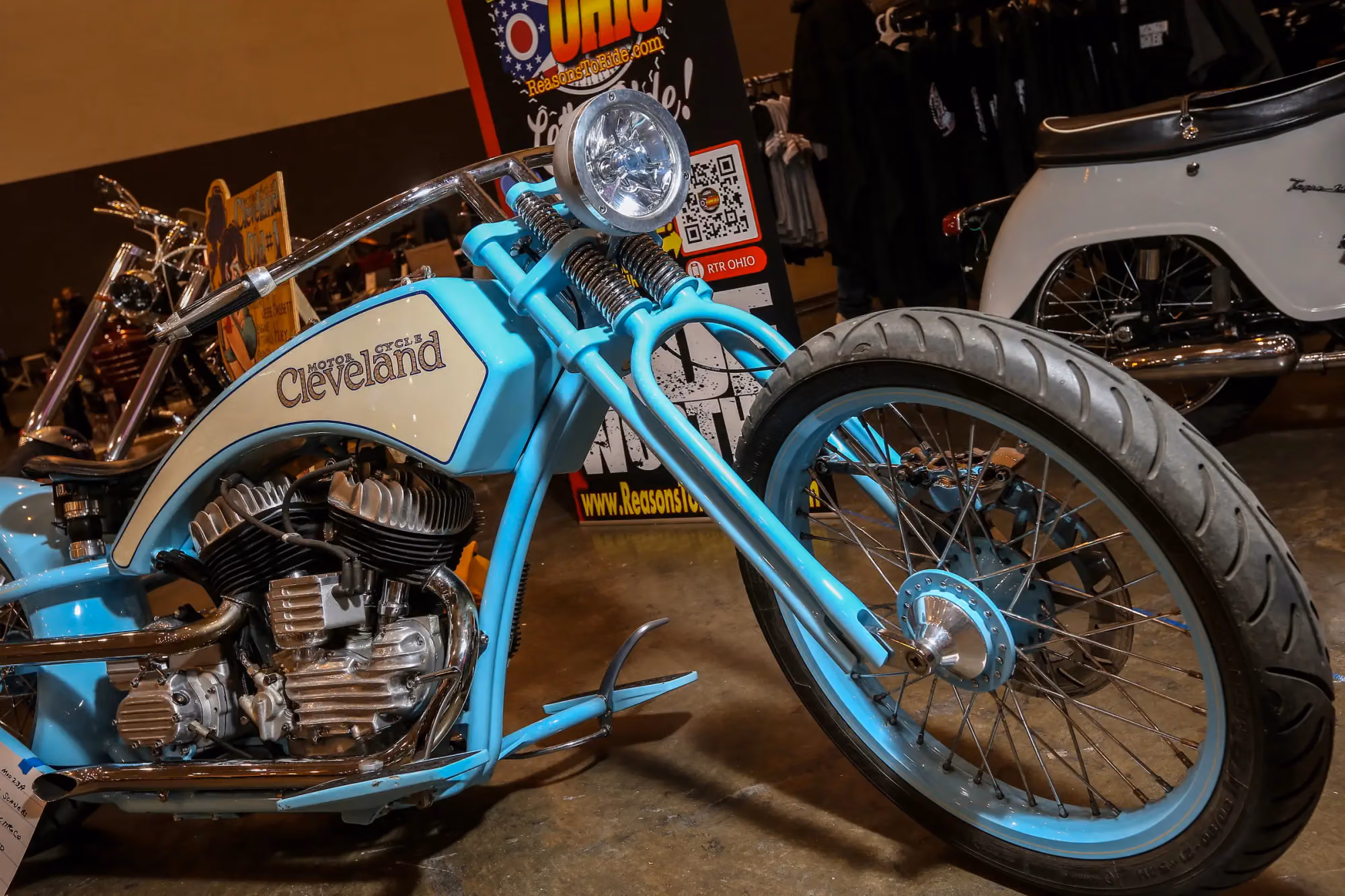 A cyan and white custom chopper