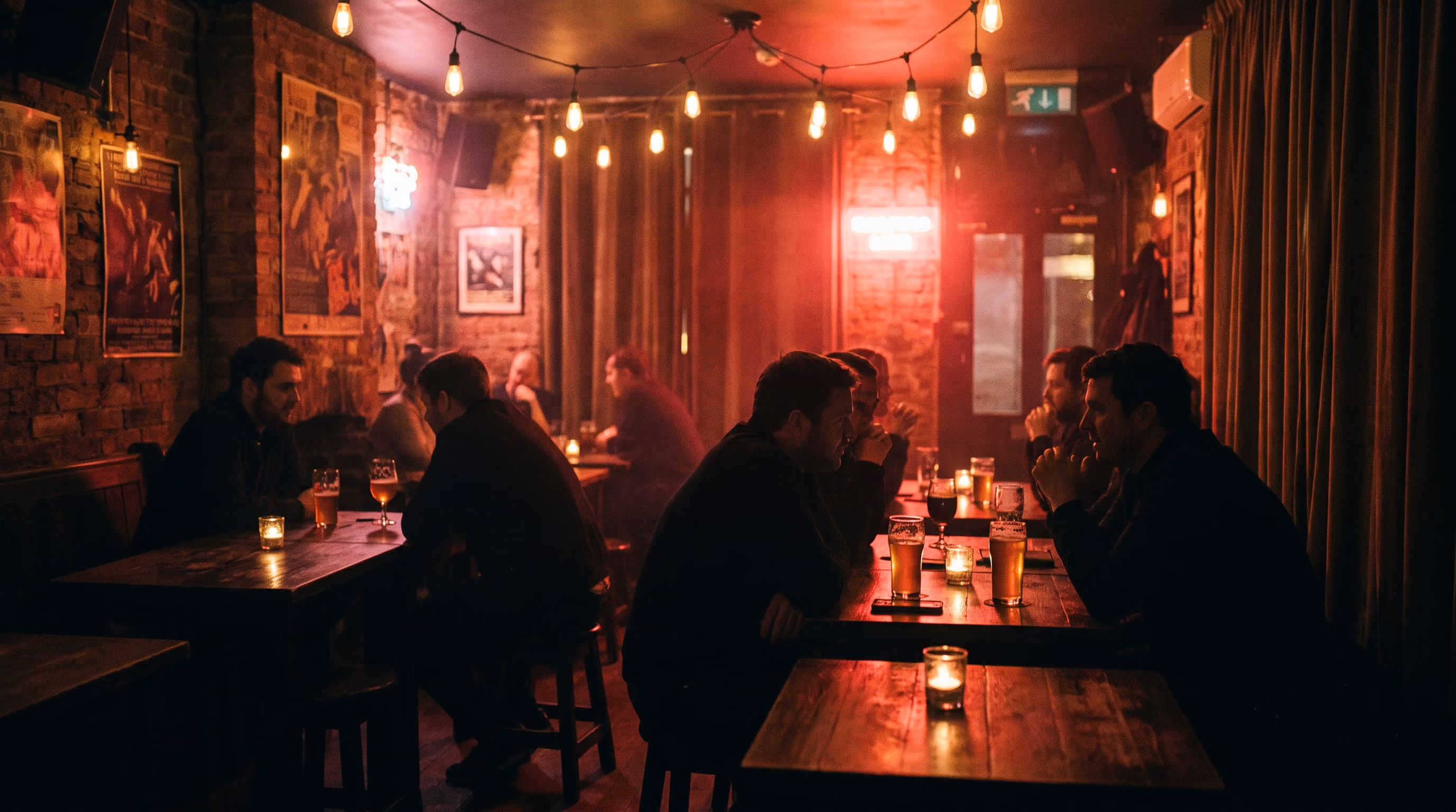 Cozy pub bar with tables and warm lights inside the venue