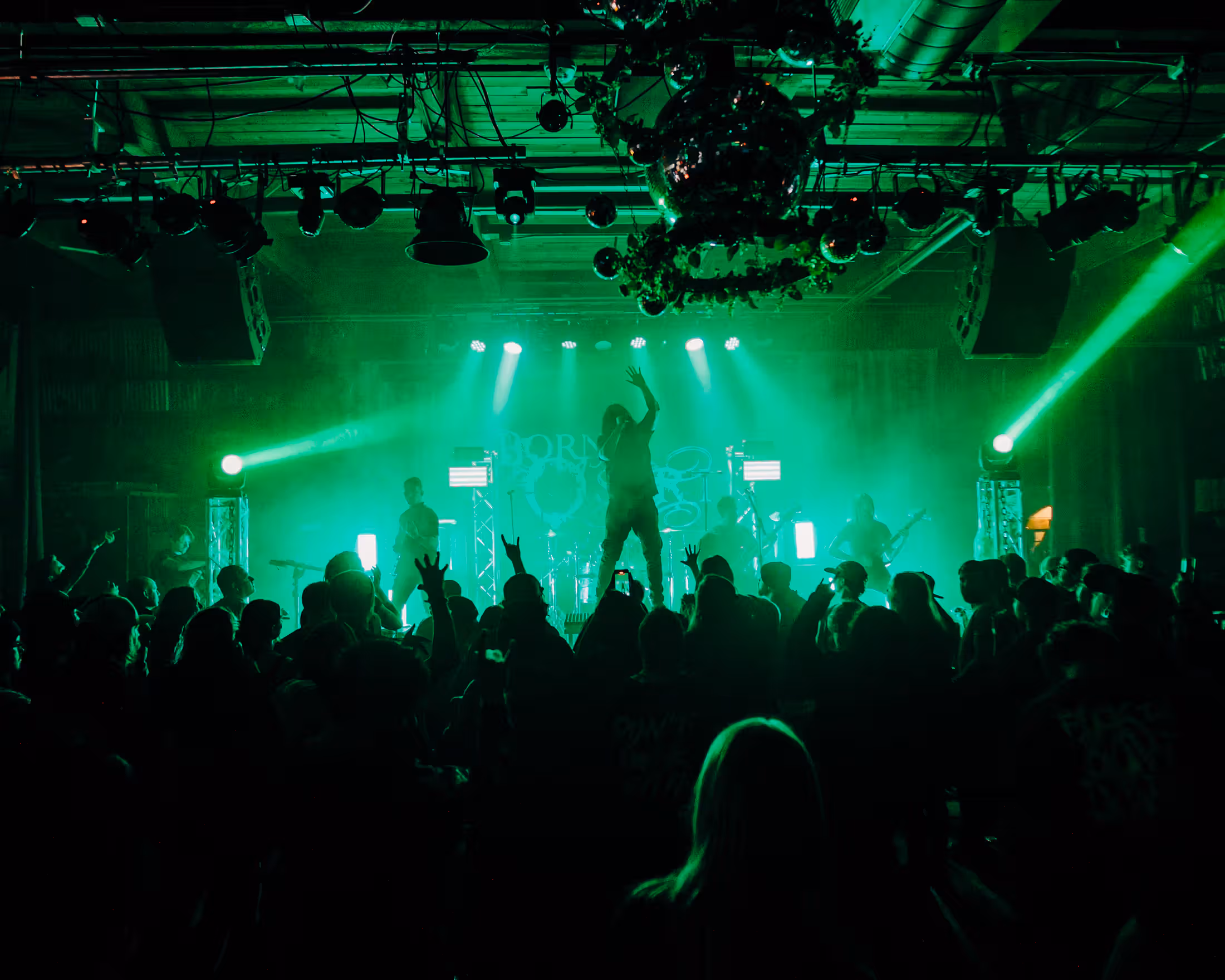 Crowd seen from the stage at a Volcanic Theatre Pub show