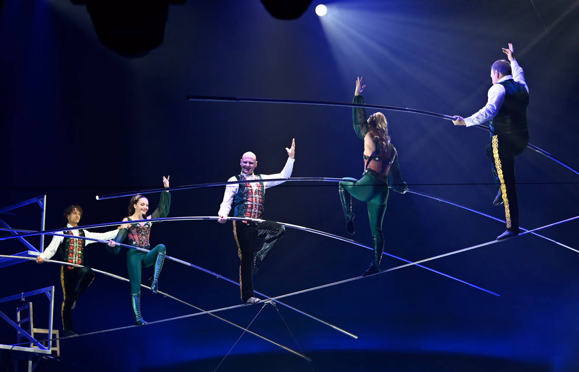 Performers taking a bow in the spotlight