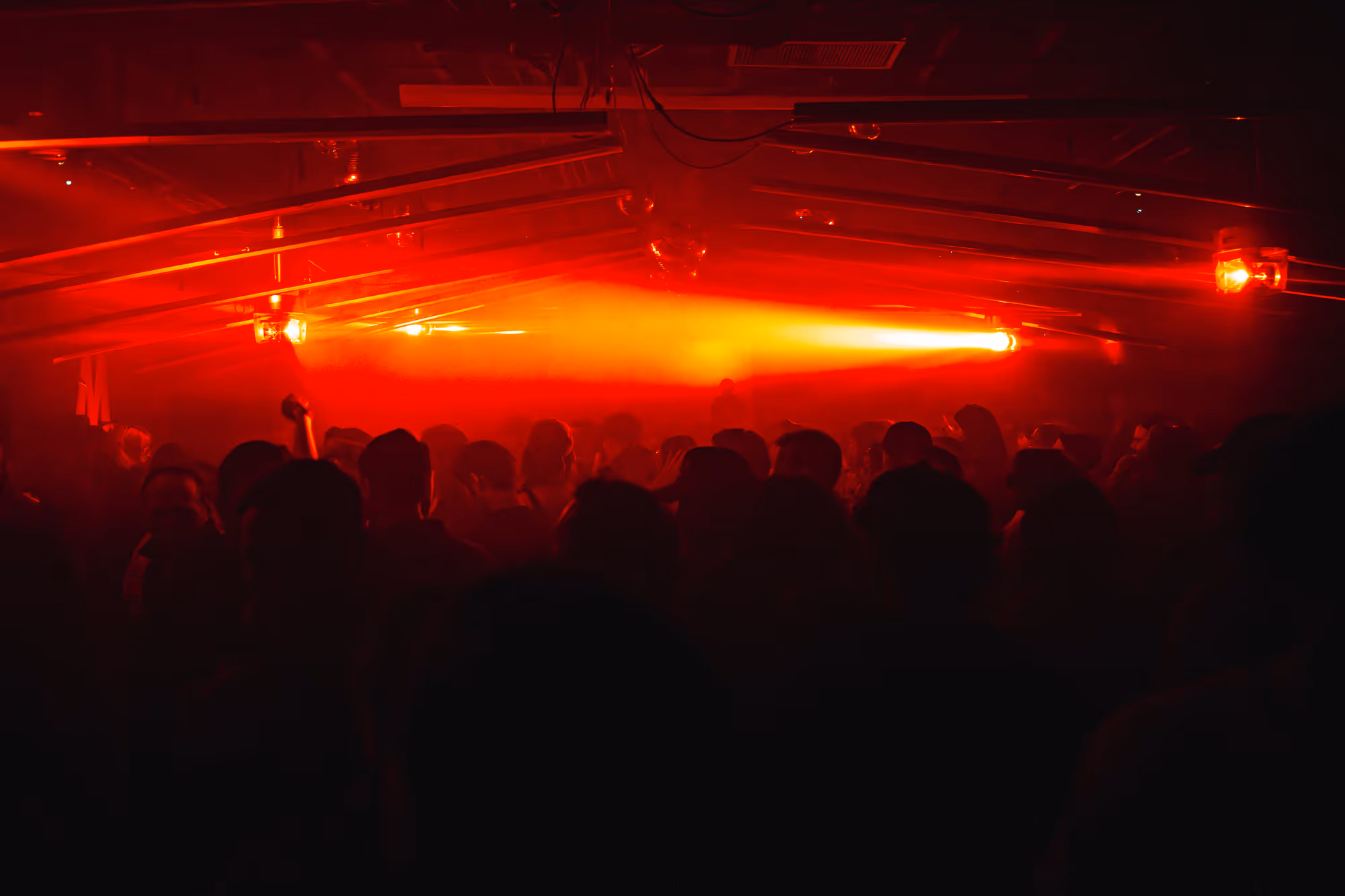 Red light across the crowd at Warehouse on Watts