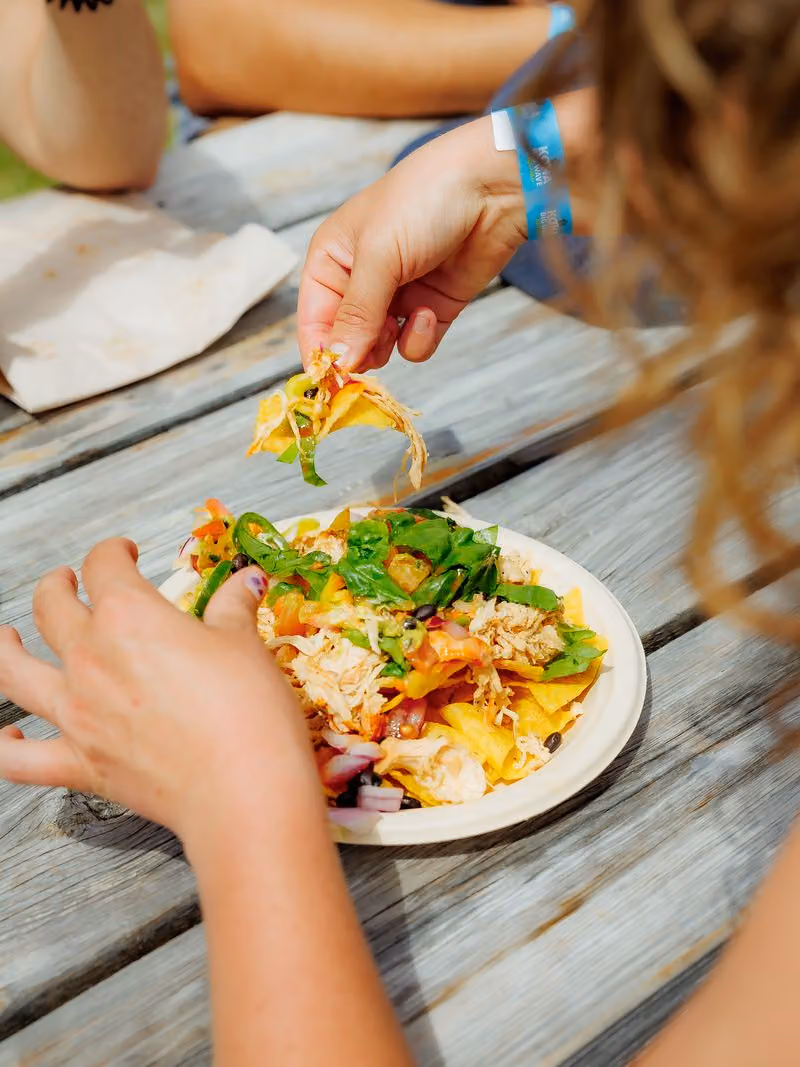 Loaded plate of festival nachos