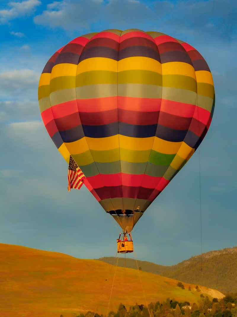 Colorful hot air balloon floating over Missoula